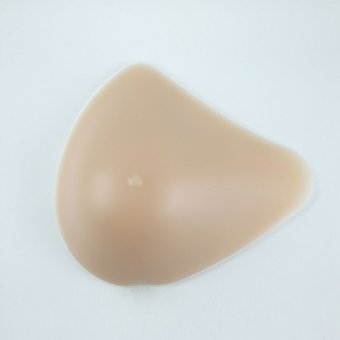 Экзопротез молочной железы Novea полновесный  из плотной пленки (крепкий) ассиметричной формы