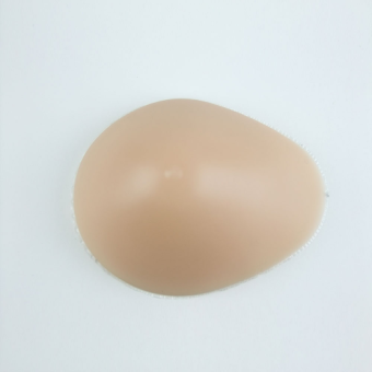 Симметричный протез-накладка Novea с глубоко впадиной из прочной пленки.